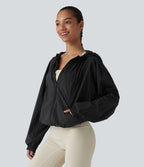 Veste de course légère à capuche manches longues avec poches, cordon de serrage et protection UPF 50+