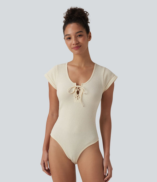 Body décontracté col rond à lacets manches courtes boutons-pression tissu gaufré