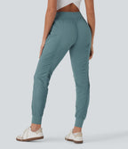 Pantalon jogging de voyage taille haute avec cordon de serrage, coupe fuselée et poches latérales zippées