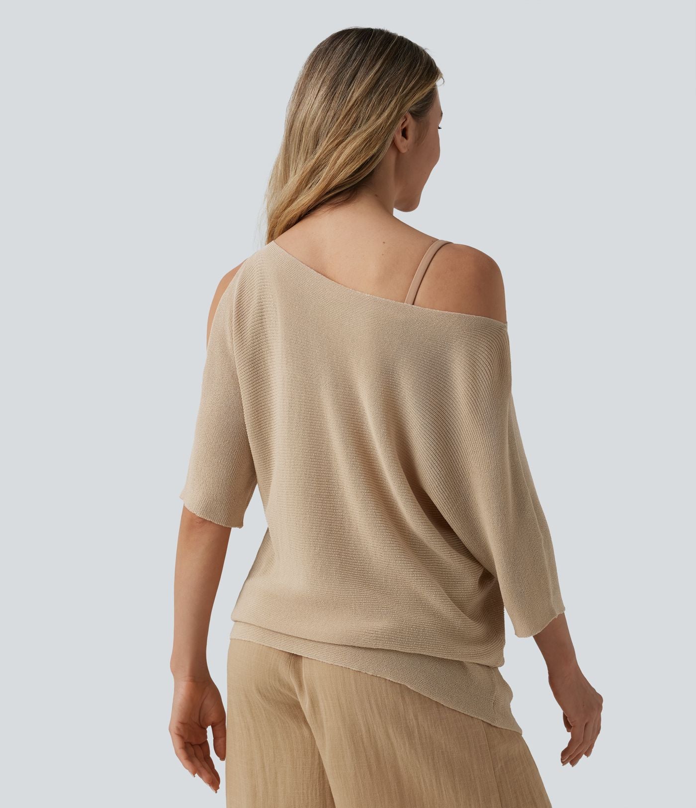 Pull décontracté asymétrique demi-manches