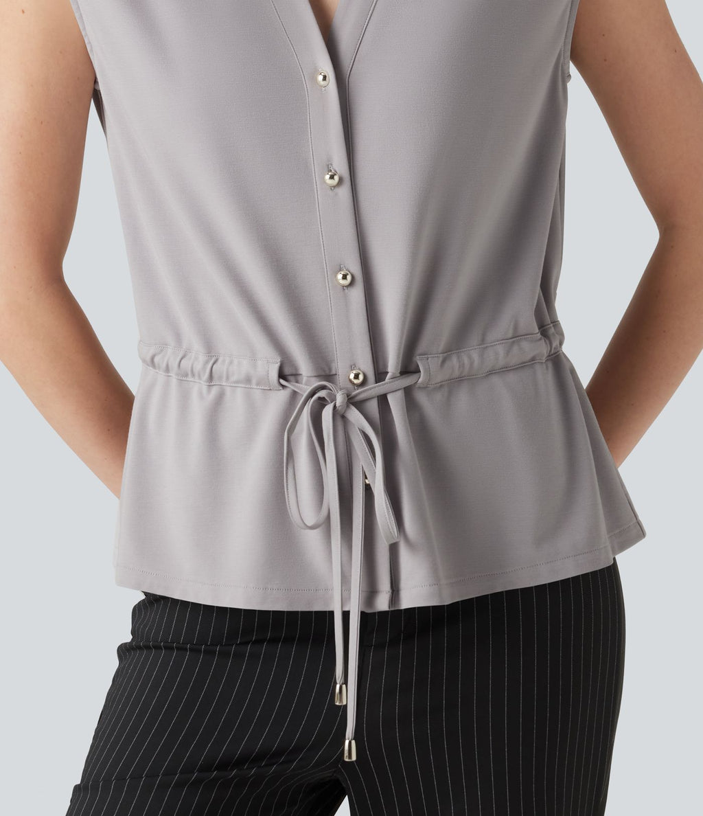 Chemise tailleur sans manches col V avec braguette boutonnée et cordon