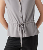 Chemise tailleur sans manches col V avec braguette boutonnée et cordon