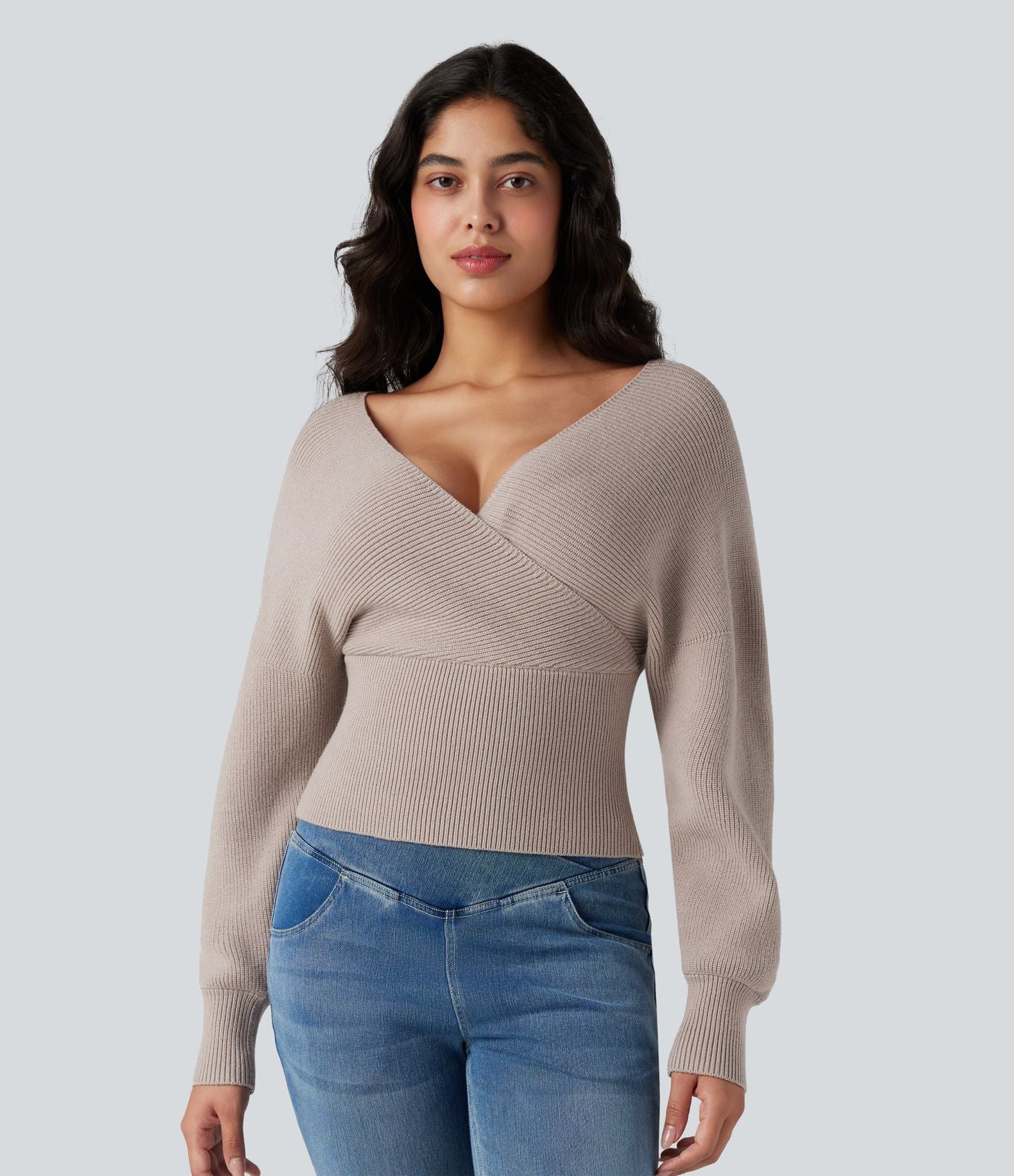 Pull col V manches chauve-souris longues à découpes