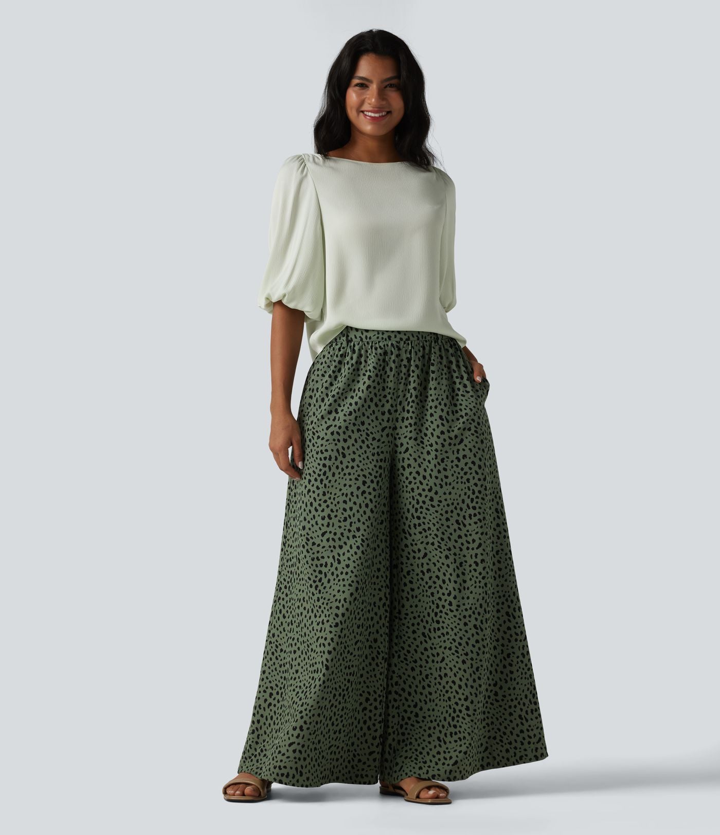 Blouse décontractée à manches bouffantes et ourlet arrondi texturé