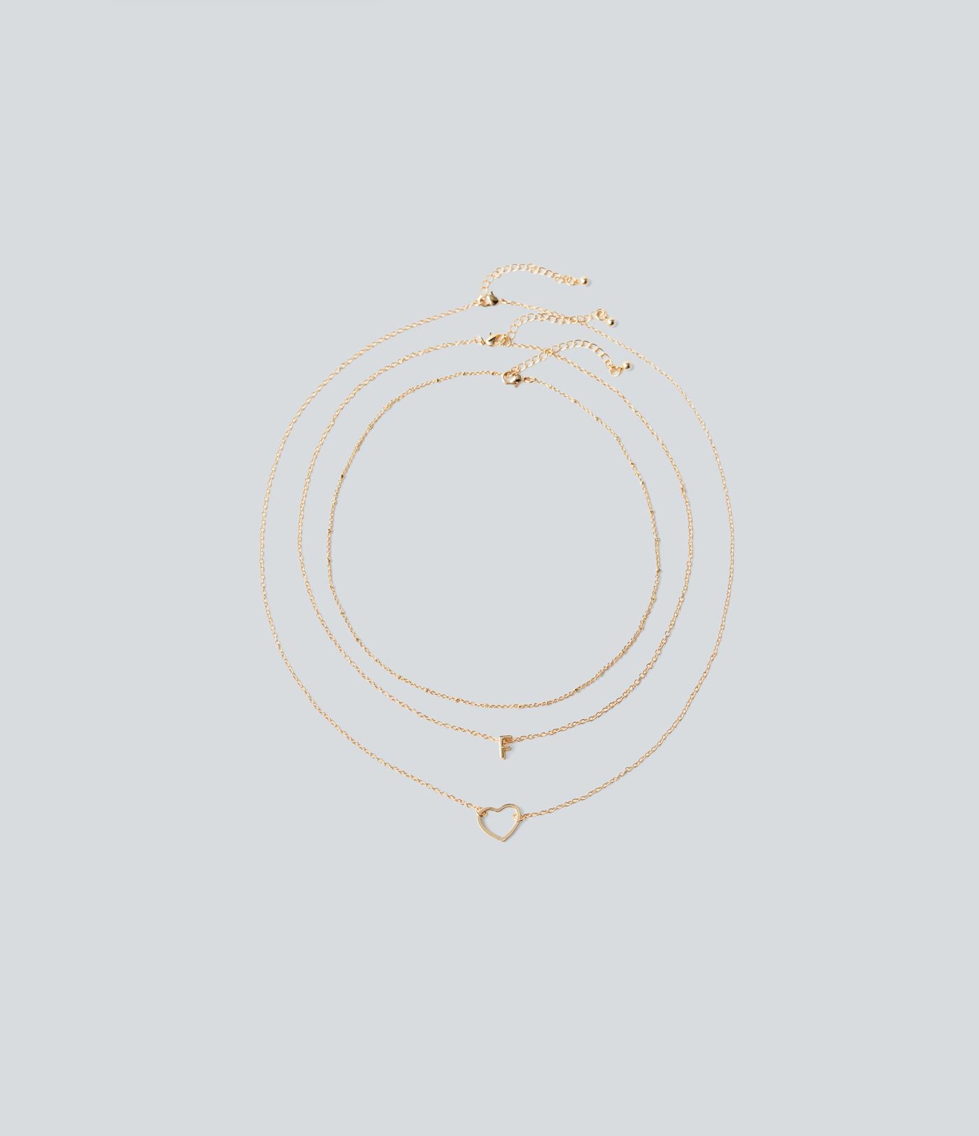 Ensemble de colliers pendentifs lettre + cœur