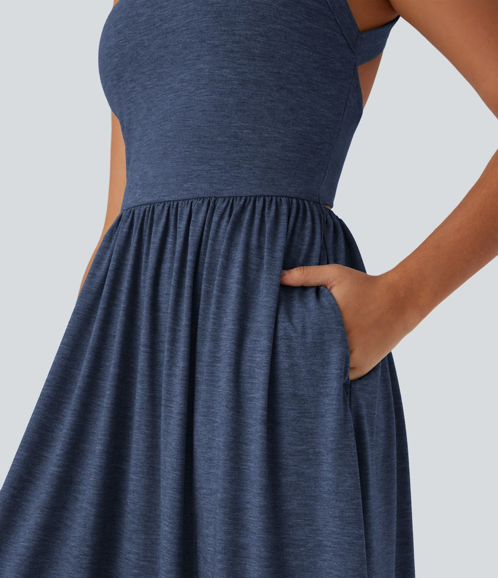 Robe longue fluide fendue avec poches latérales, dos nu et effet torsadé