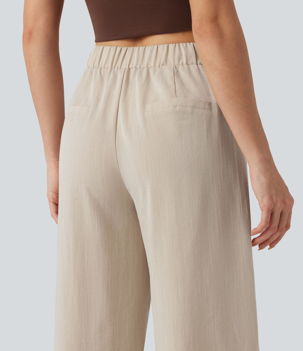 Pantalon tailleur asymétrique effet lin, taille moyenne, coupe ballon, à poches