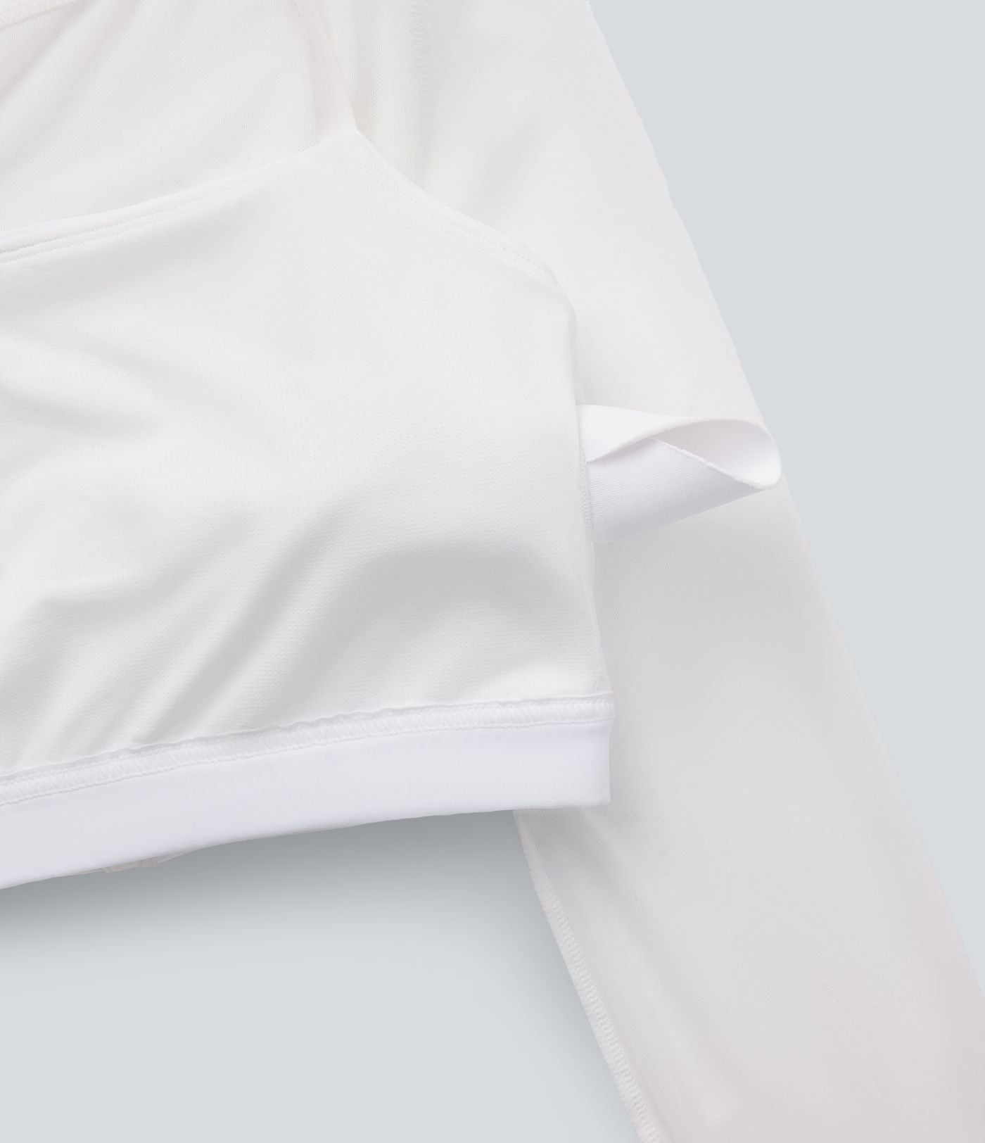 Haut de sport yoga crop top 2-en-1 avec col licou, dos nu, manches longues, passe-pouces et mesh contrastant