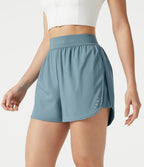 Short de sport 7,5 cm Breezeful™ 2-en-1 séchage rapide taille haute en mesh contrastant à poches