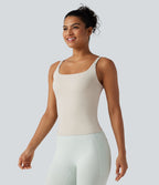 Débardeur de sport effet lissant sous les bras avec dos en V et brassière intégrée