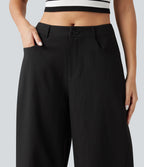 Pantalon décontracté à taille mi-haute, coupe ample et jambes fuselées, avec poches