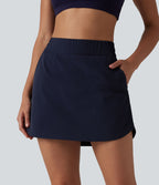 Jupe mini de randonnée 2-en-1 taille haute ourlet arrondi avec poches