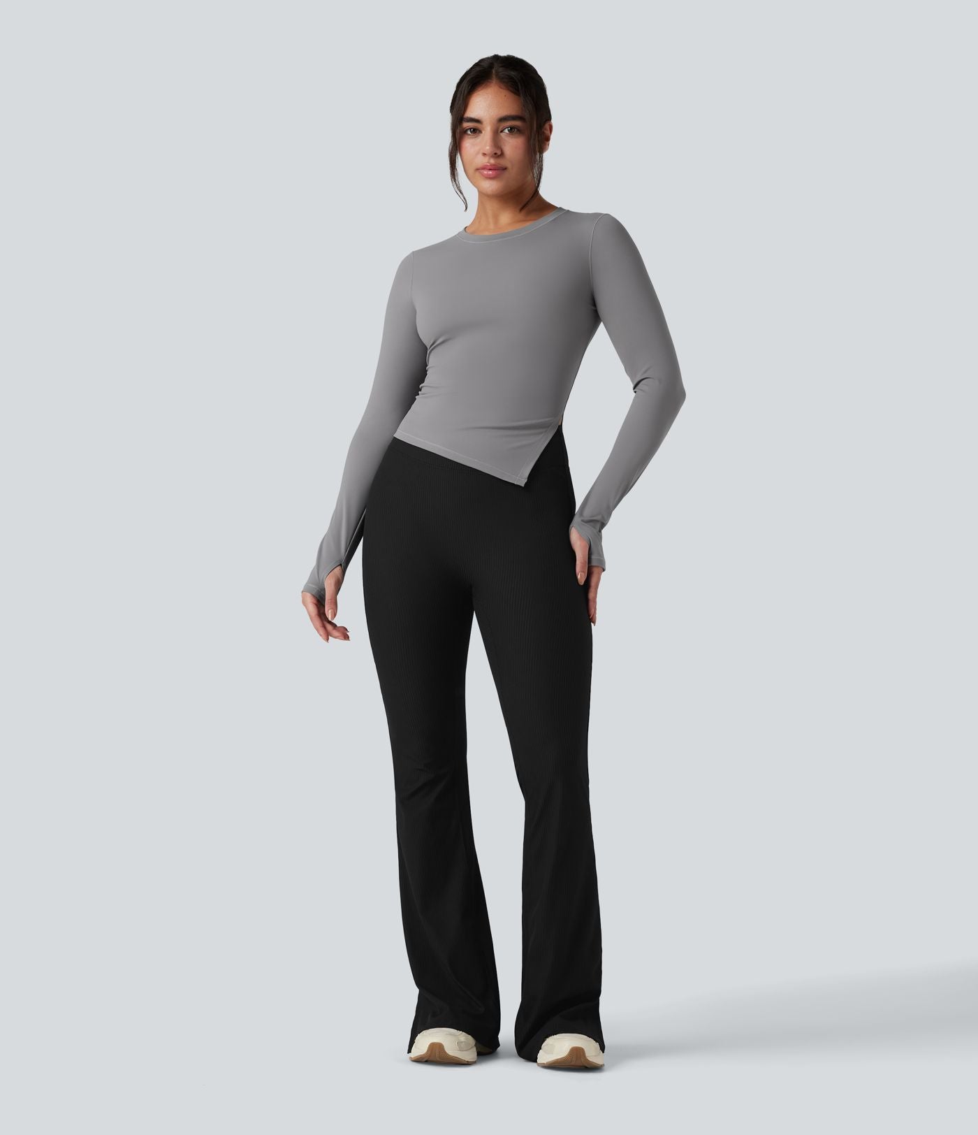 Top de sport yoga col rond ourlet asymétrique fendu manches longues avec trous pouces
