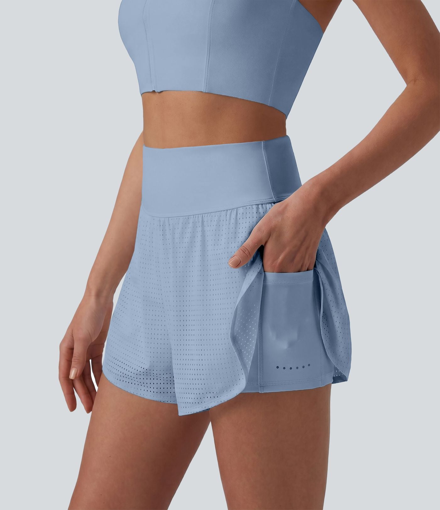 Short yoga 2-en-1 gainant taille haute à pois réfléchissants, ourlet arrondi croisé et œillets avec poches