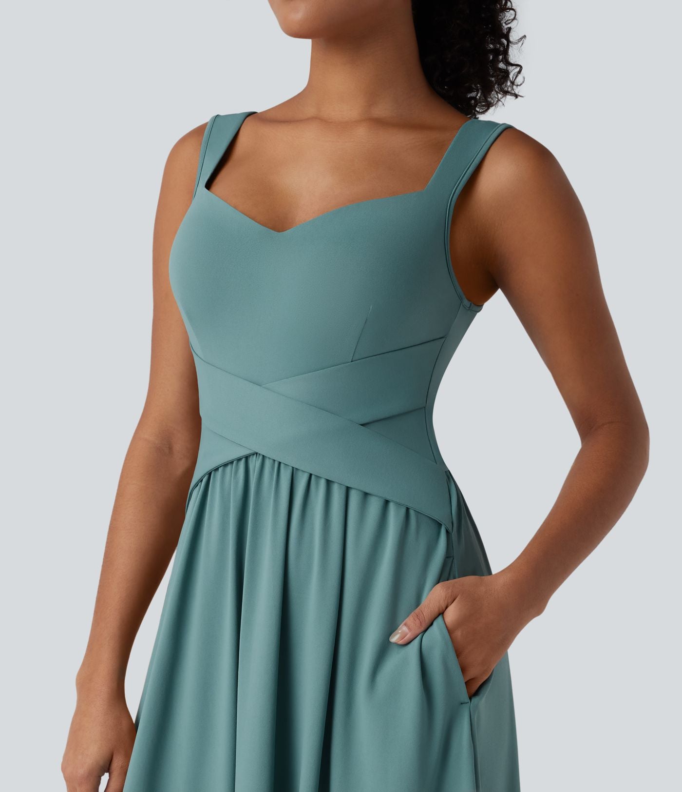 Robe midi fluide sans manches dos croisé ouvert avec poches