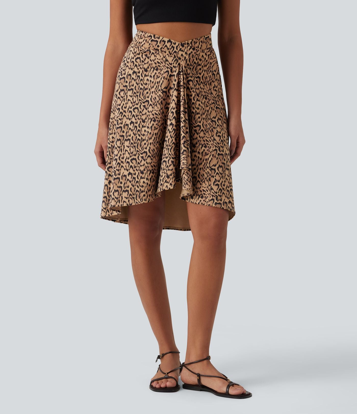 Jupe resort taille haute croisée ourlet asymétrique