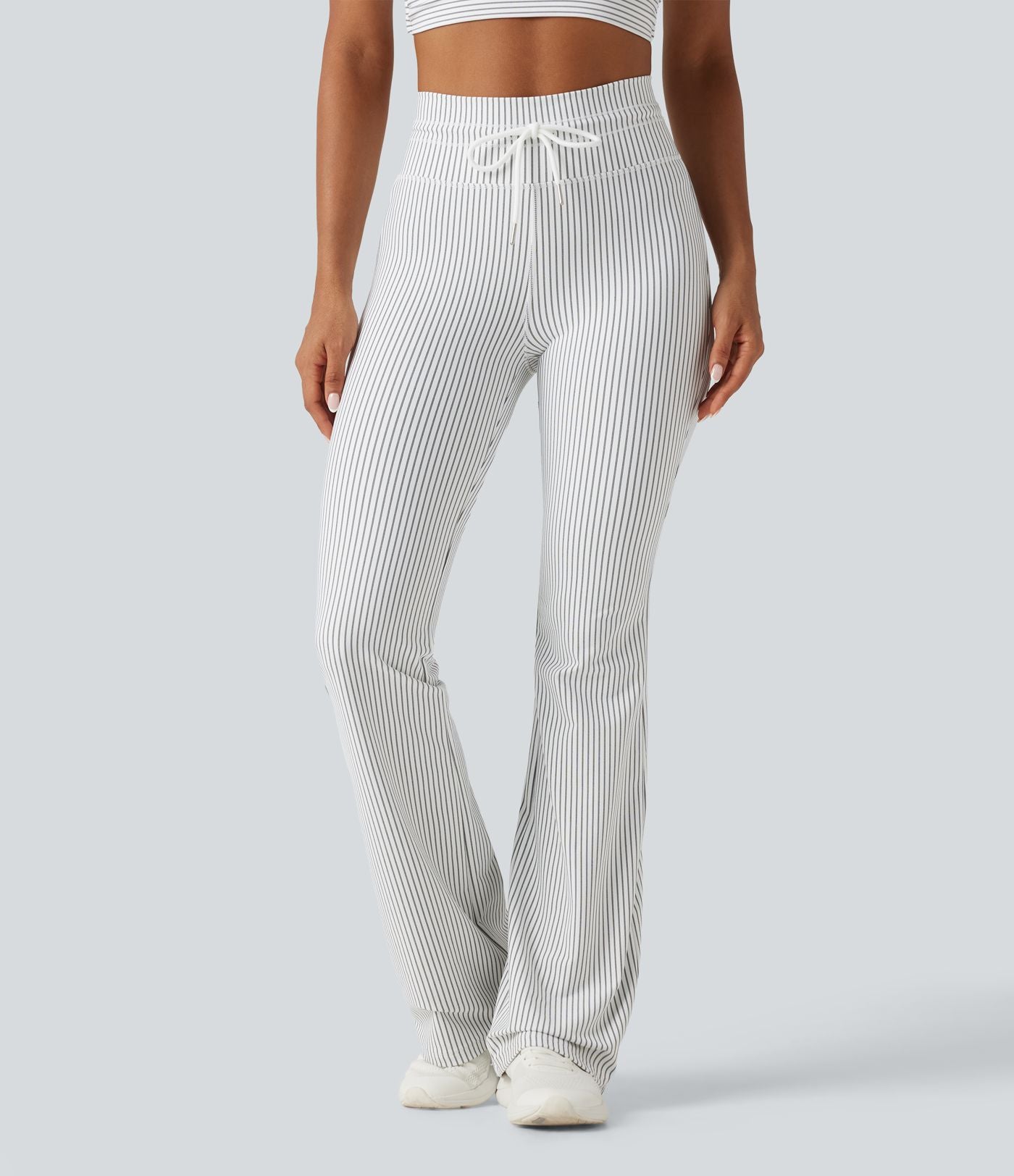 Pantalon de yoga flare taille haute rayé avec cordon de serrage et poches
