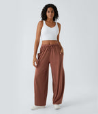 Pantalon Large Fluide Taille Mi-Haute Taille Élastique Cordon Poches Latérales Ourlet Flottant