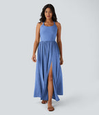 Robe longue fluide fendue avec poches latérales, dos nu et effet torsadé