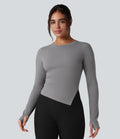 Top de sport yoga col rond ourlet asymétrique fendu manches longues avec trous pouces