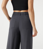 Pantalon casual ample toucher lin taille mi-haute à poches