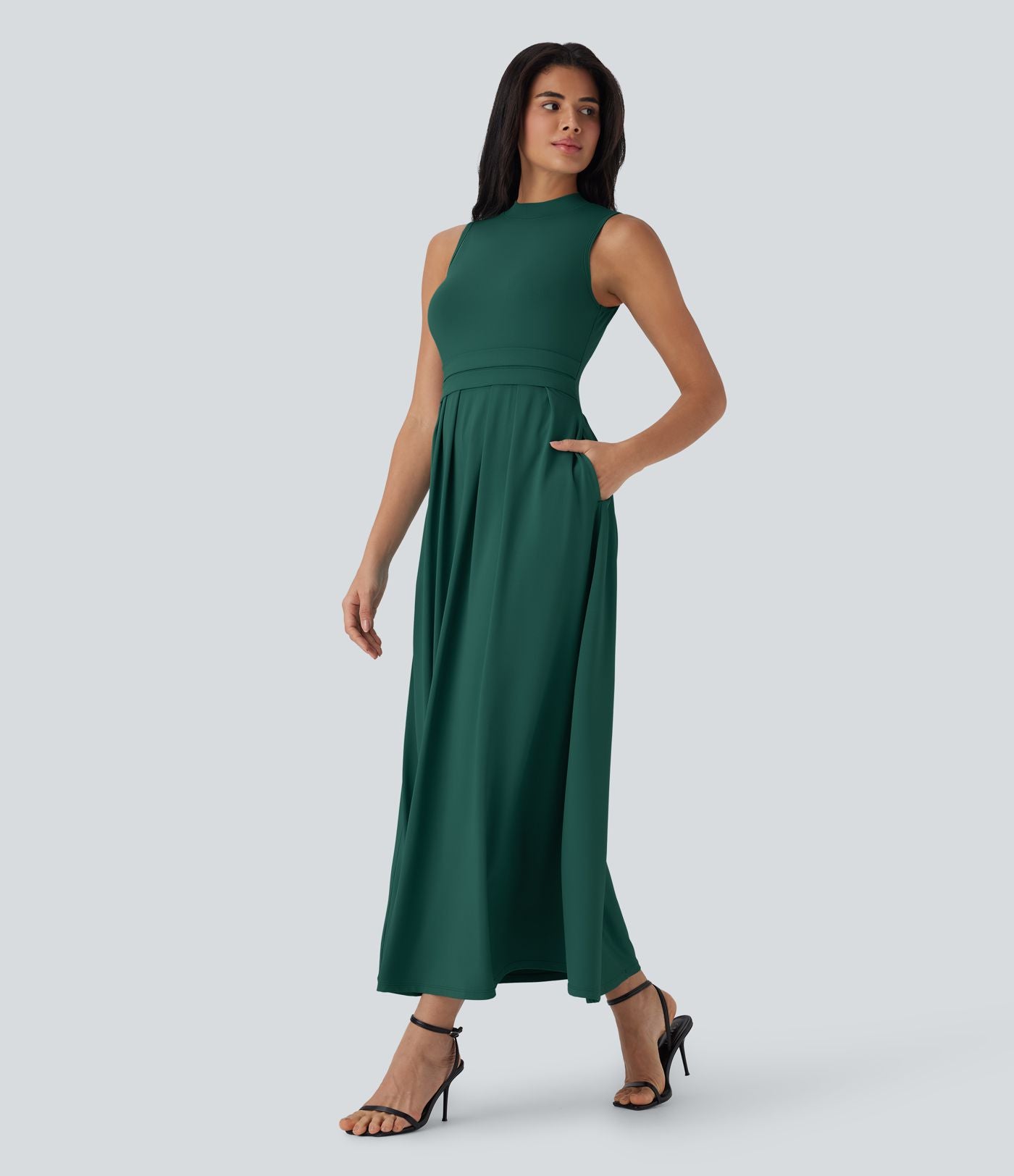 Robe longue décontractée sans manches à col montant, coupe évasée et poches latérales