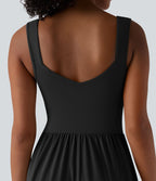 Robe midi fluide sans manches dos croisé ouvert avec poches