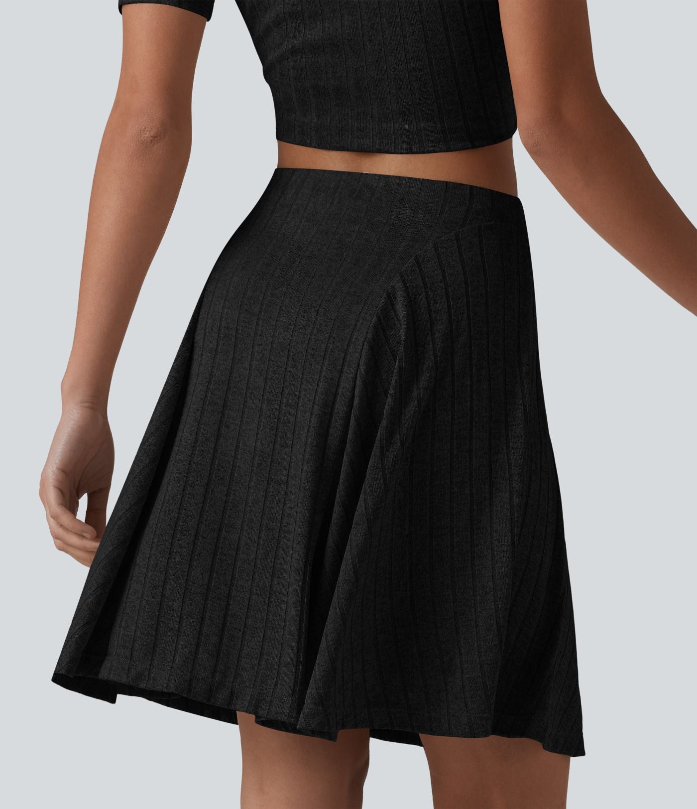 Jupe mini évasée casual 2 en 1 en maille côtelée taille haute avec poches