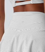Jupe-short de tennis mini taille haute croisée à rayures avec poches