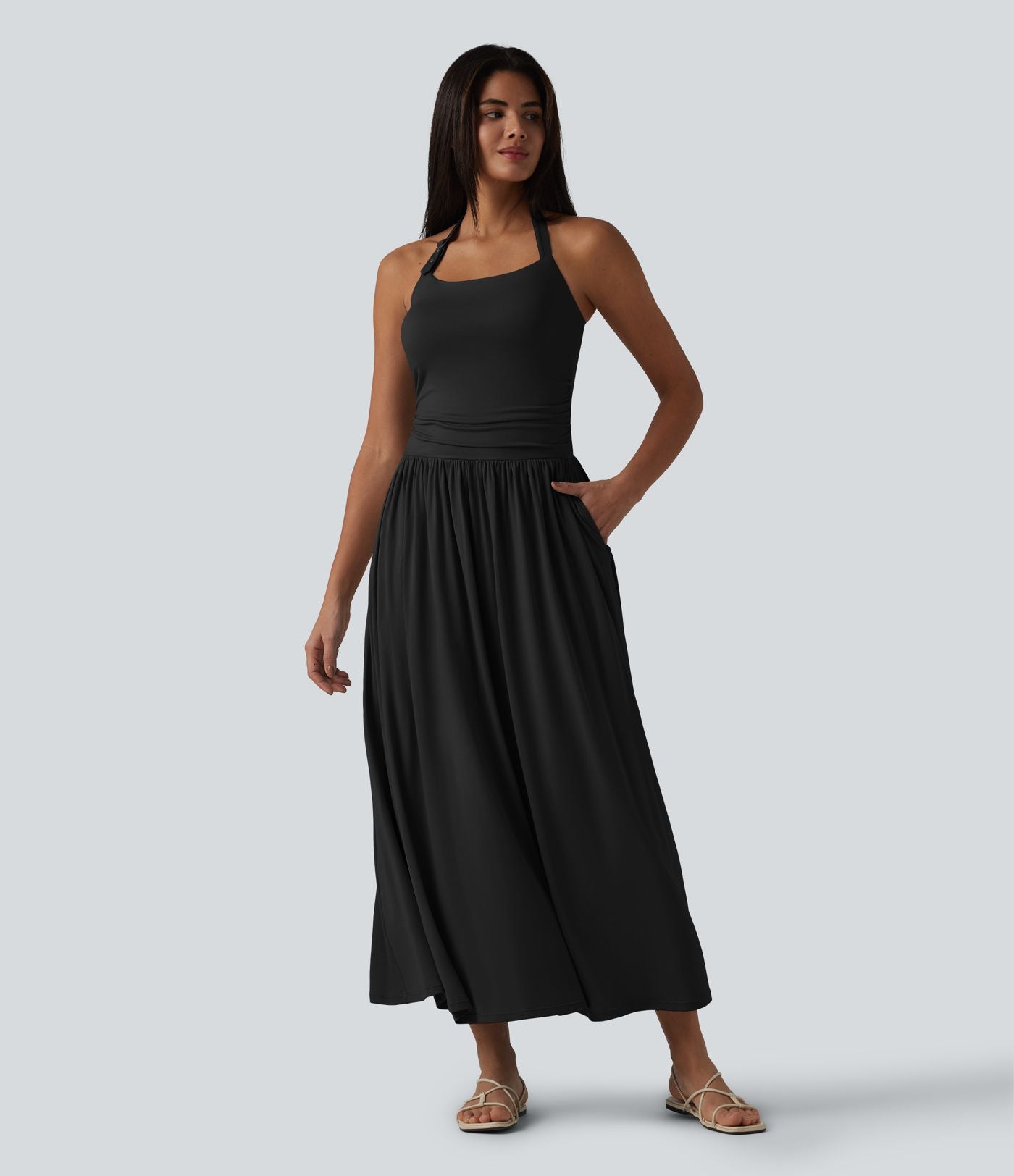 Robe longue fluide dos nu avec tour de cou, brassière intégrée et poches