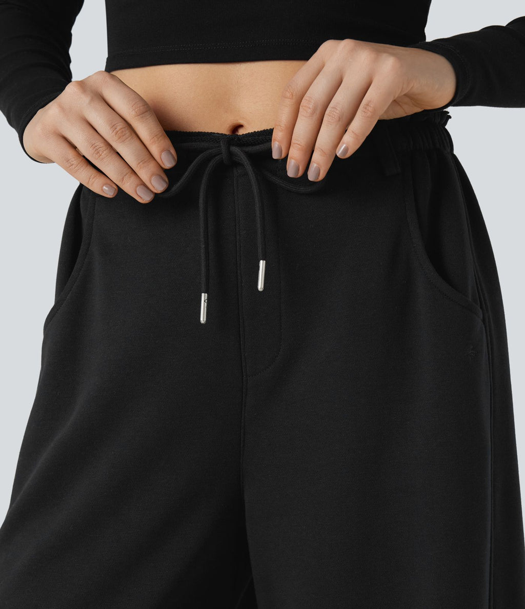 Pantalon jogging large taille mi-haute finition brute avec cordon de serrage et poches