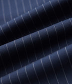 Pantalon tailleur fuselé 7/8 taille haute à rayures avec poches