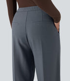 Pantalon tailleur taille haute fermeture éclair jambe droite avec poches