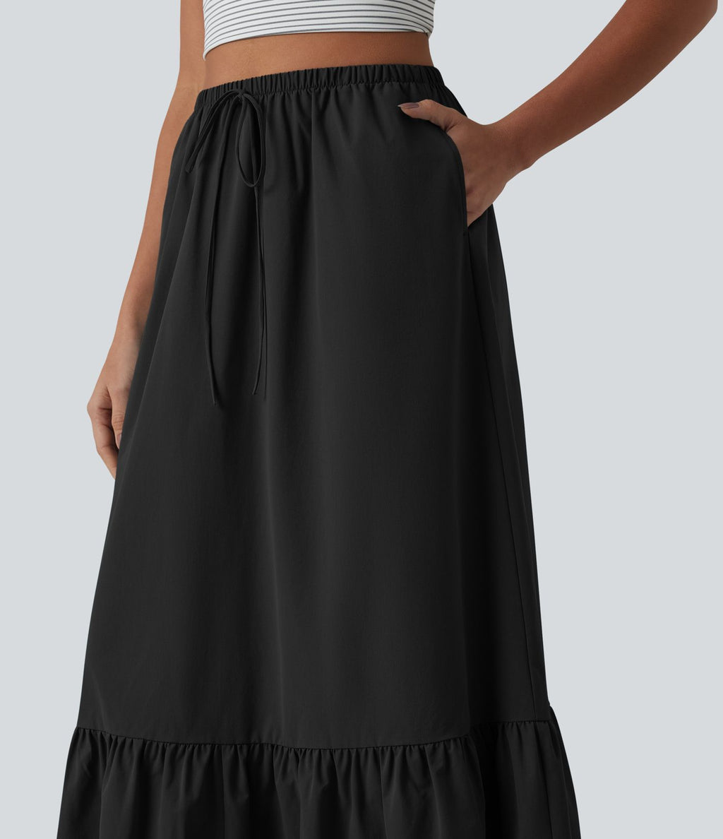 Jupe casual mi-longue évasée en popeline stretch taille haute avec cordon de serrage, ourlet volanté et poches