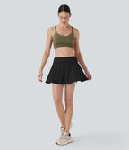 Jupe patineuse micro-mini de yoga 2-en-1 taille ultra basse à rabat avec poches