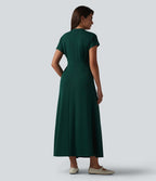 Robe midi à manches courtes chauve-souris et col en V avec poches