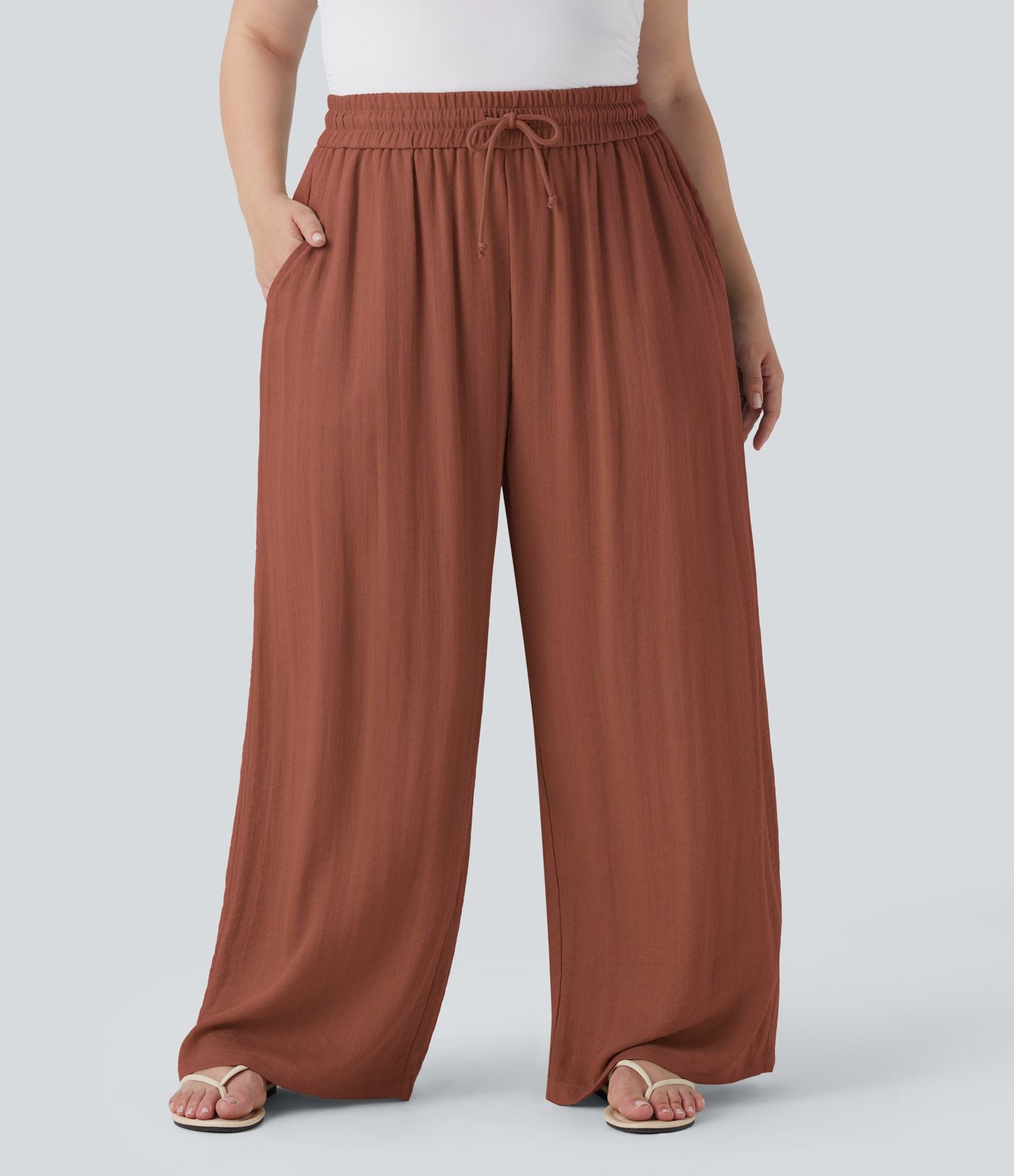Pantalon décontracté grande taille large fluide taille haute effet lin avec cordon de serrage et poches