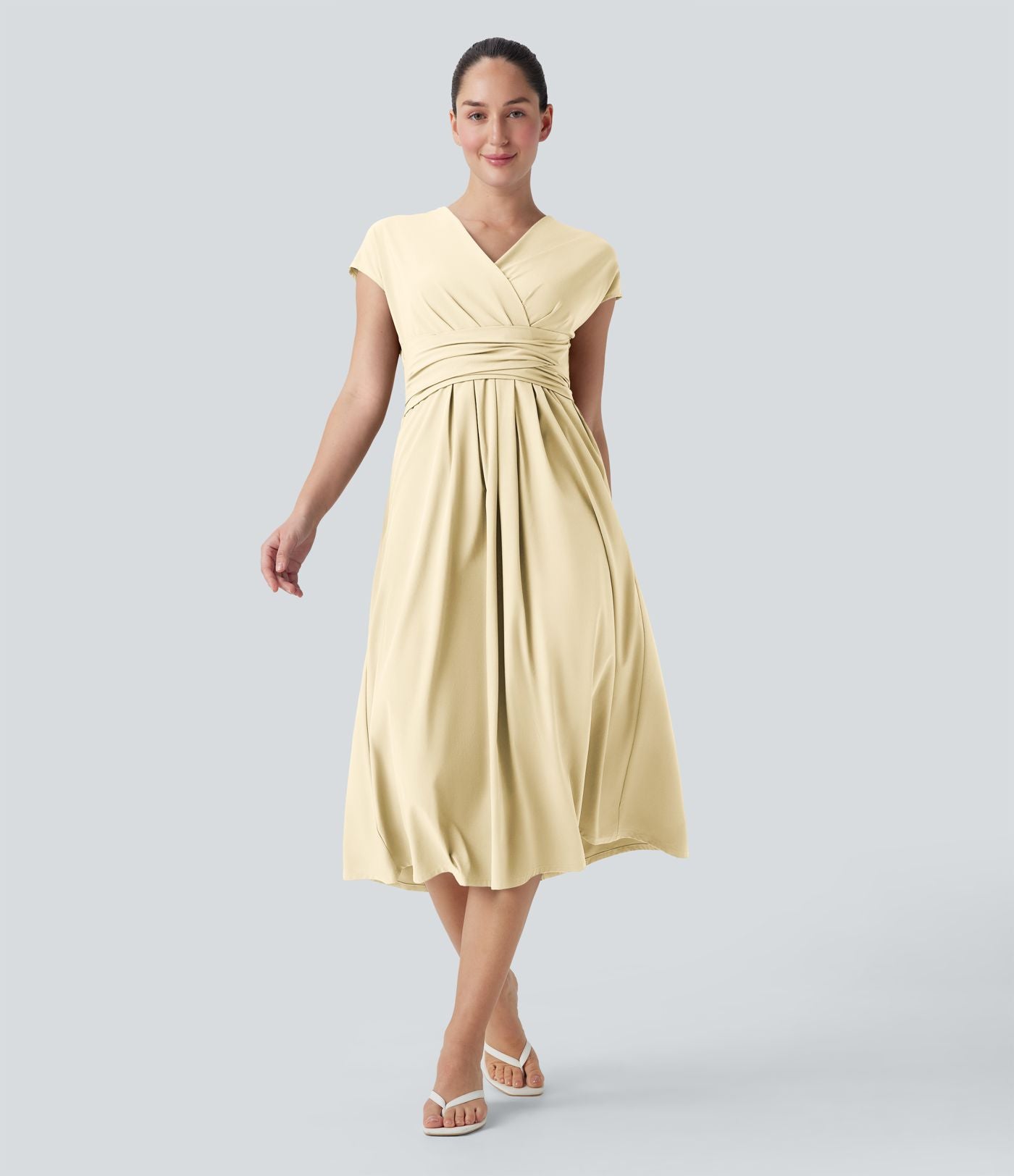 Robe midi Breezeful™ col V manches courtes à liens dans le dos séchage rapide avec poches latérales