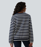 Pull casual à rayures col rond, manches longues et boutons décoratifs