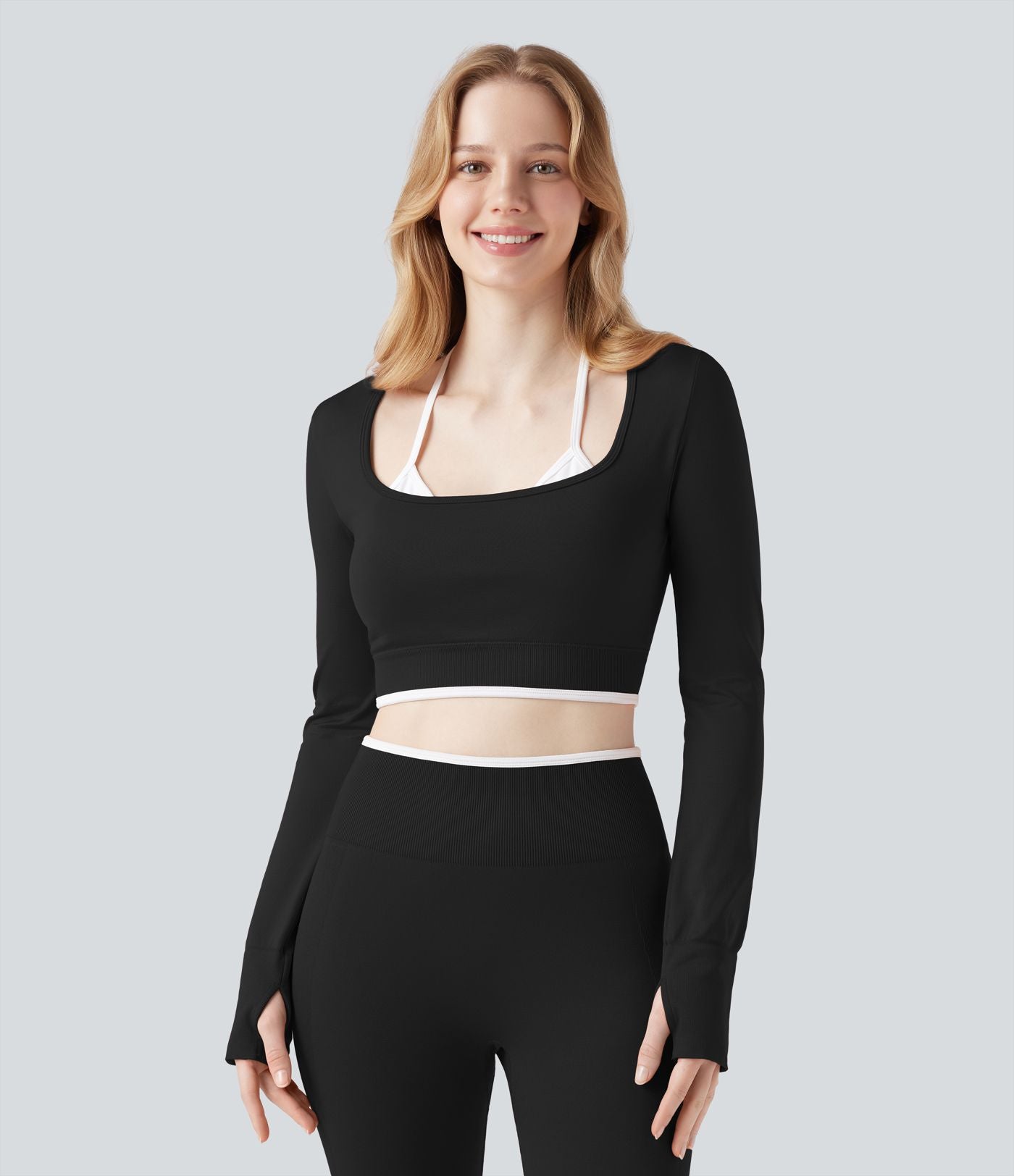 Haut de sport yoga court dos nu à manches longues avec passants pouces et blocs de couleurs sans coutures Seamless Flow