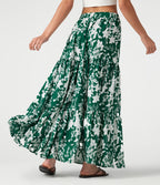 Jupe longue fluide taille haute à volants superposés imprimé floral pour les vacances