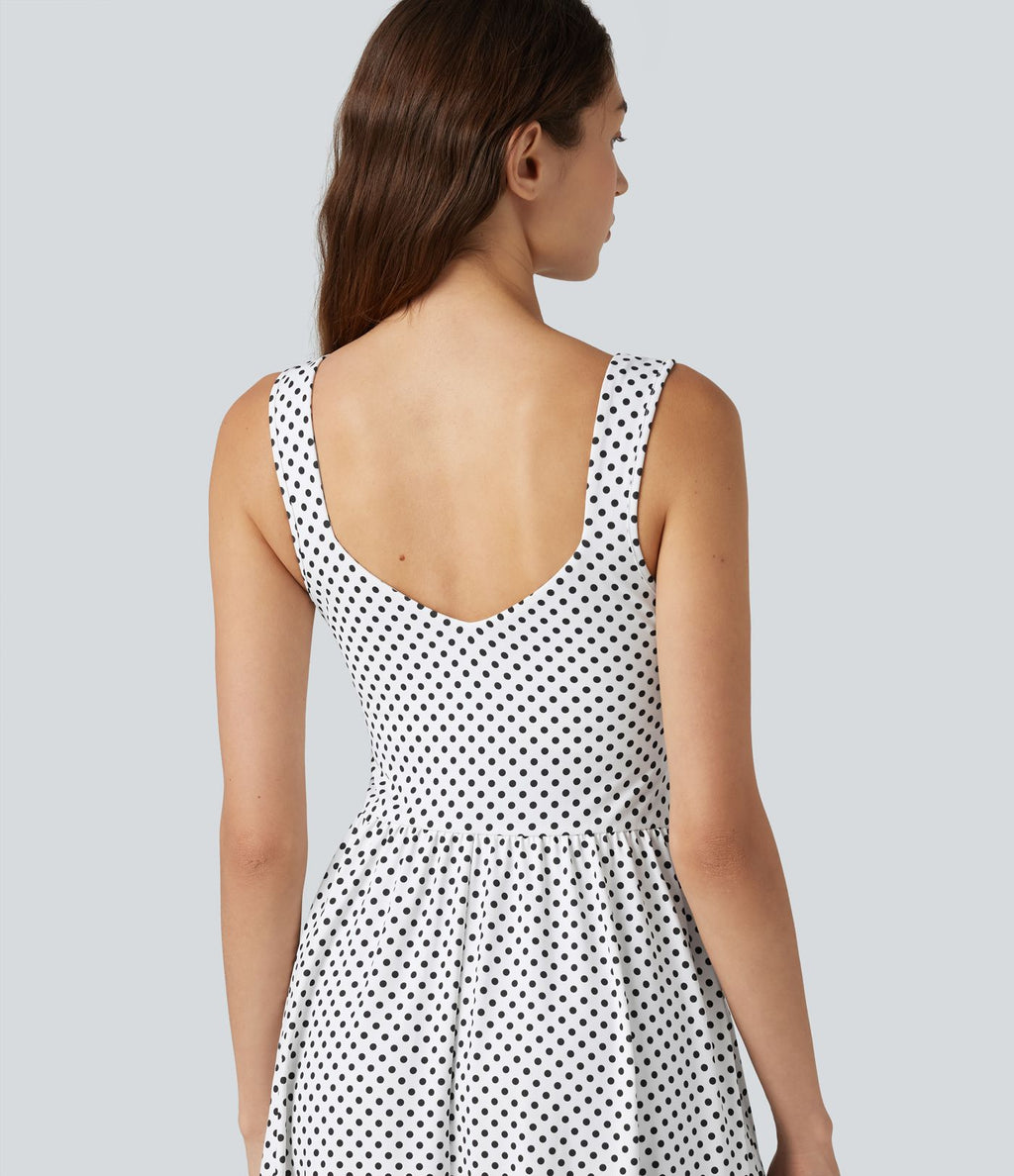 Robe fluide décontractée midi sans manches dos nu croisée à pois avec poches