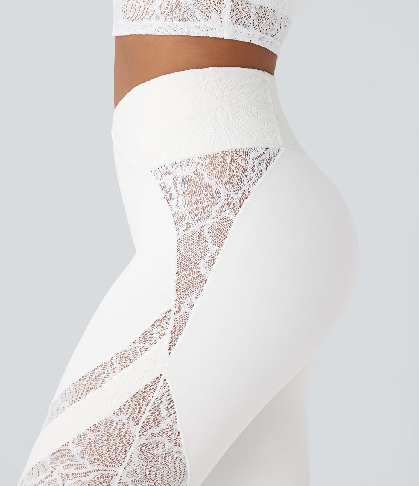 Pantalon de yoga évasé à taille haute croisée, poche arrière et dentelle