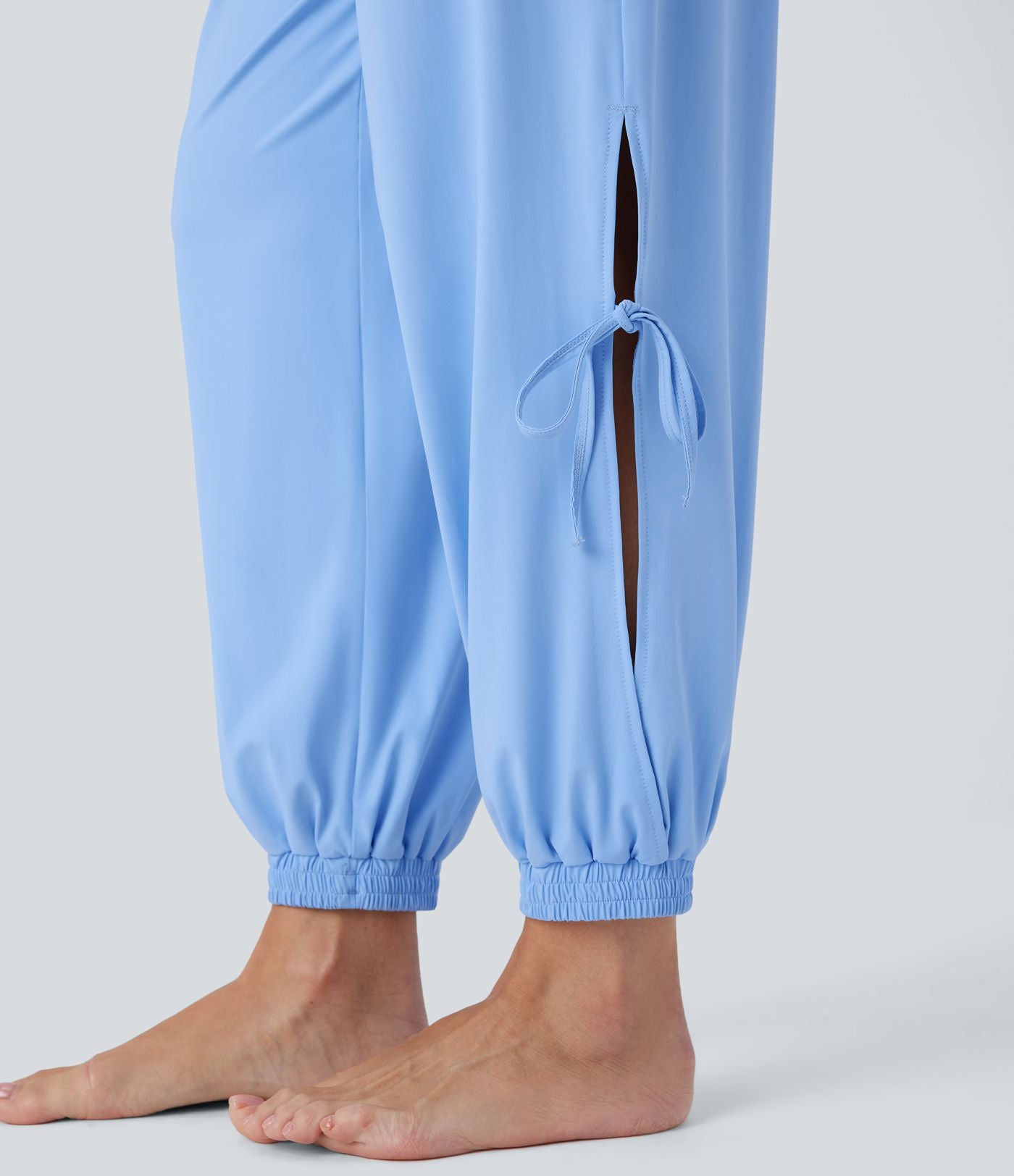 Combinaison de yoga col bateau sans manches dos nu avec découpes et poches latérales à cordon de serrage effet frais InstantCool, protection solaire UPF50+