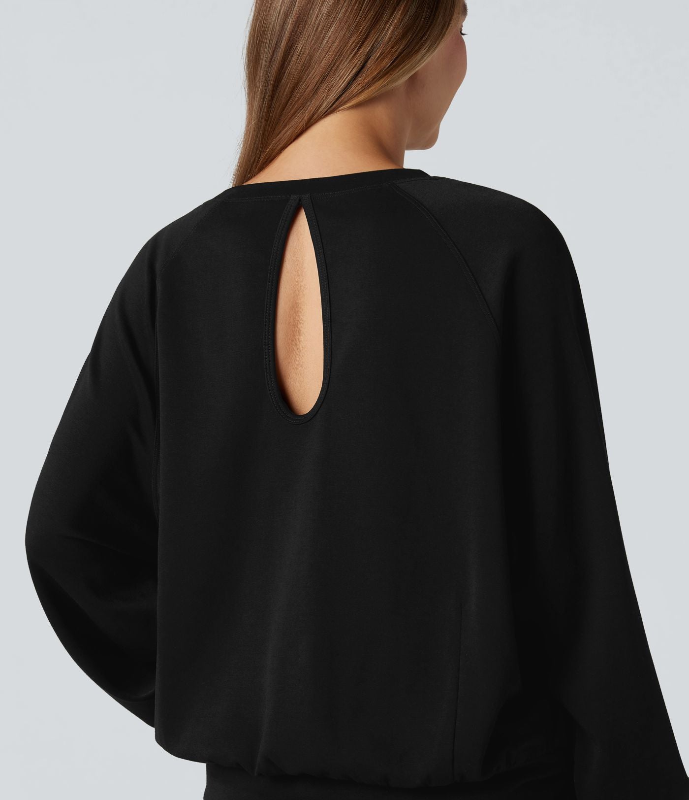 Sweat-shirt col rond manches longues à découpes avec poches