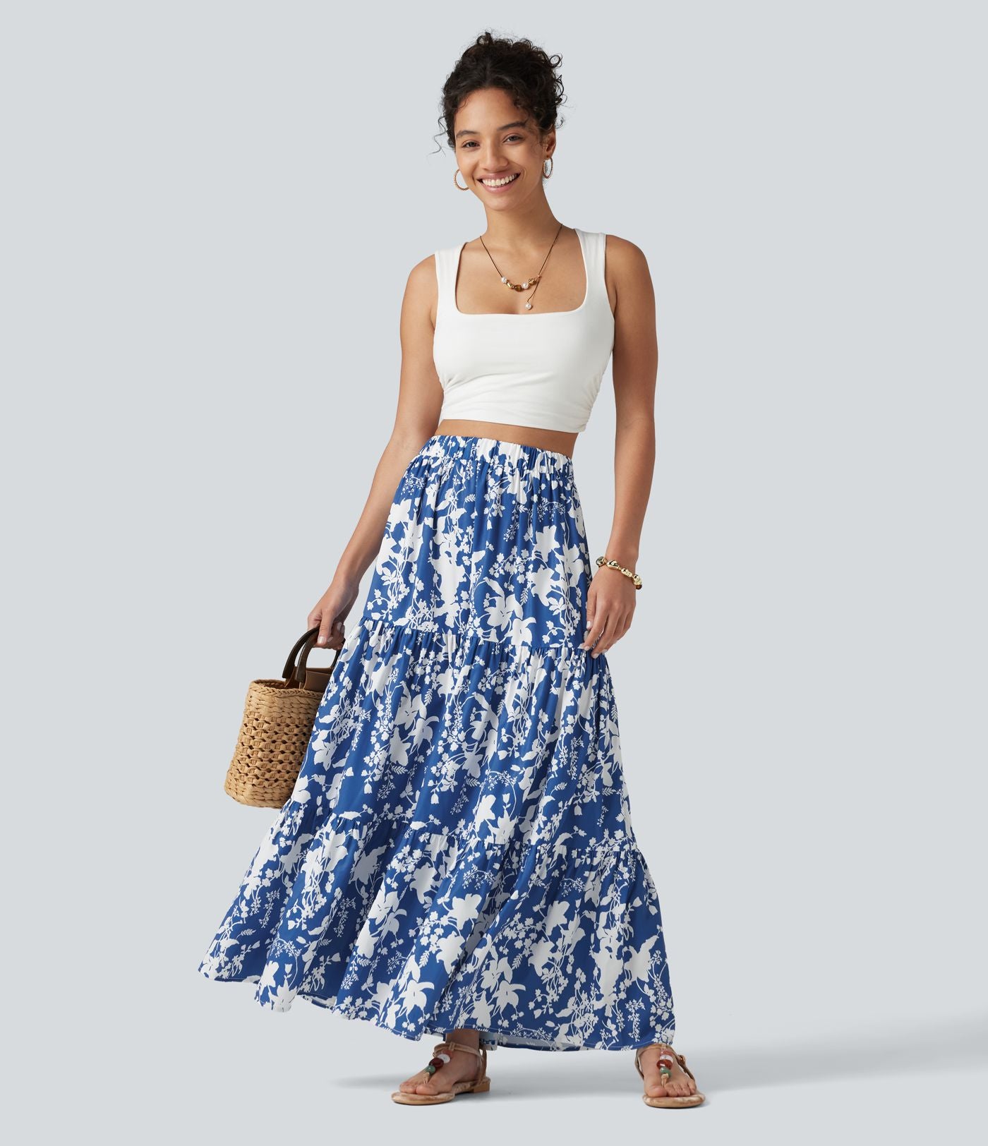Jupe longue fluide taille haute à volants superposés imprimé floral pour les vacances