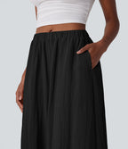 Pantalon fluide large taille mi-haute effet lin avec poche