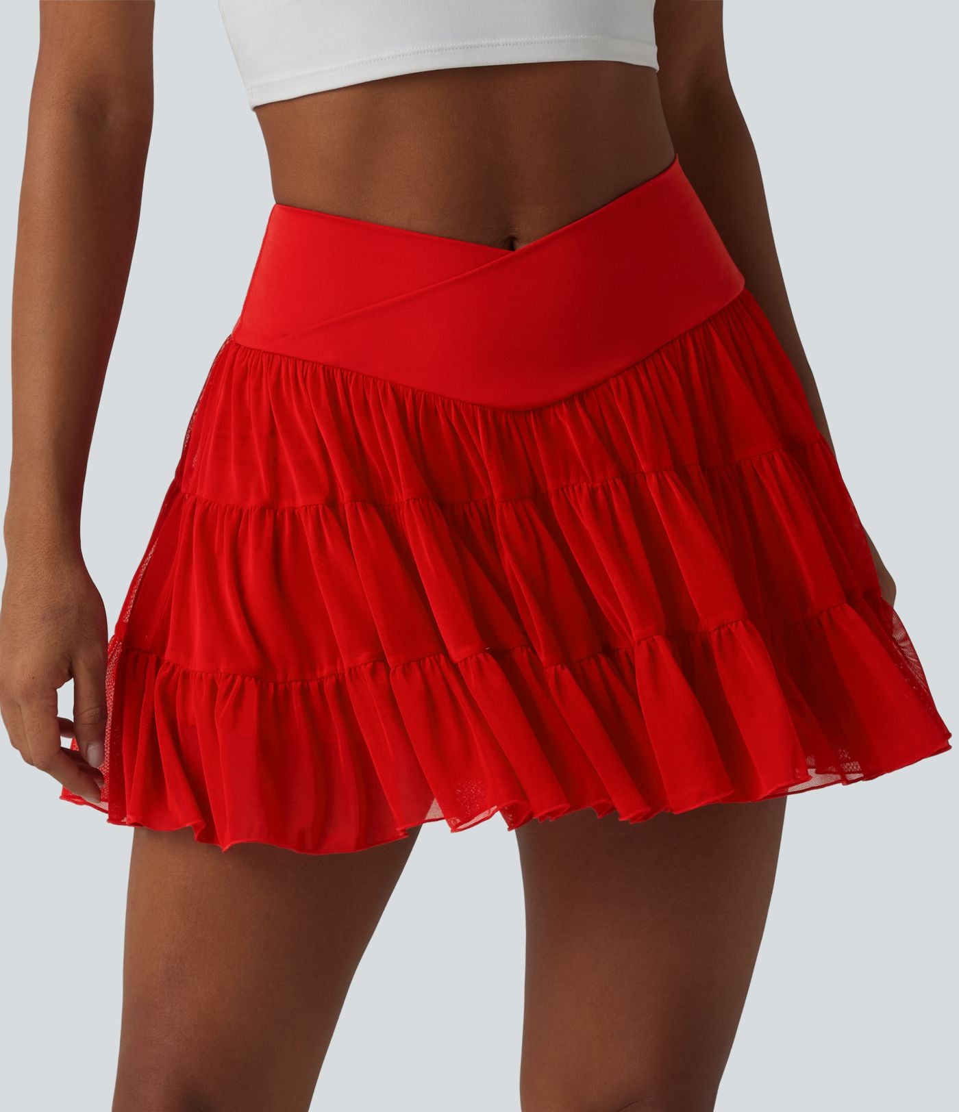 Jupe-short de tennis mini taille haute croisée fluide avec poches