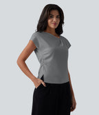 Blouse tailleur asymétrique col drapé manches courtes avec fronces et ourlet fendu