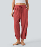 Pantalon décontracté fuselé à taille moyenne avec cordon et poches